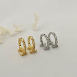 T Cubic Huggie Hoops Gold