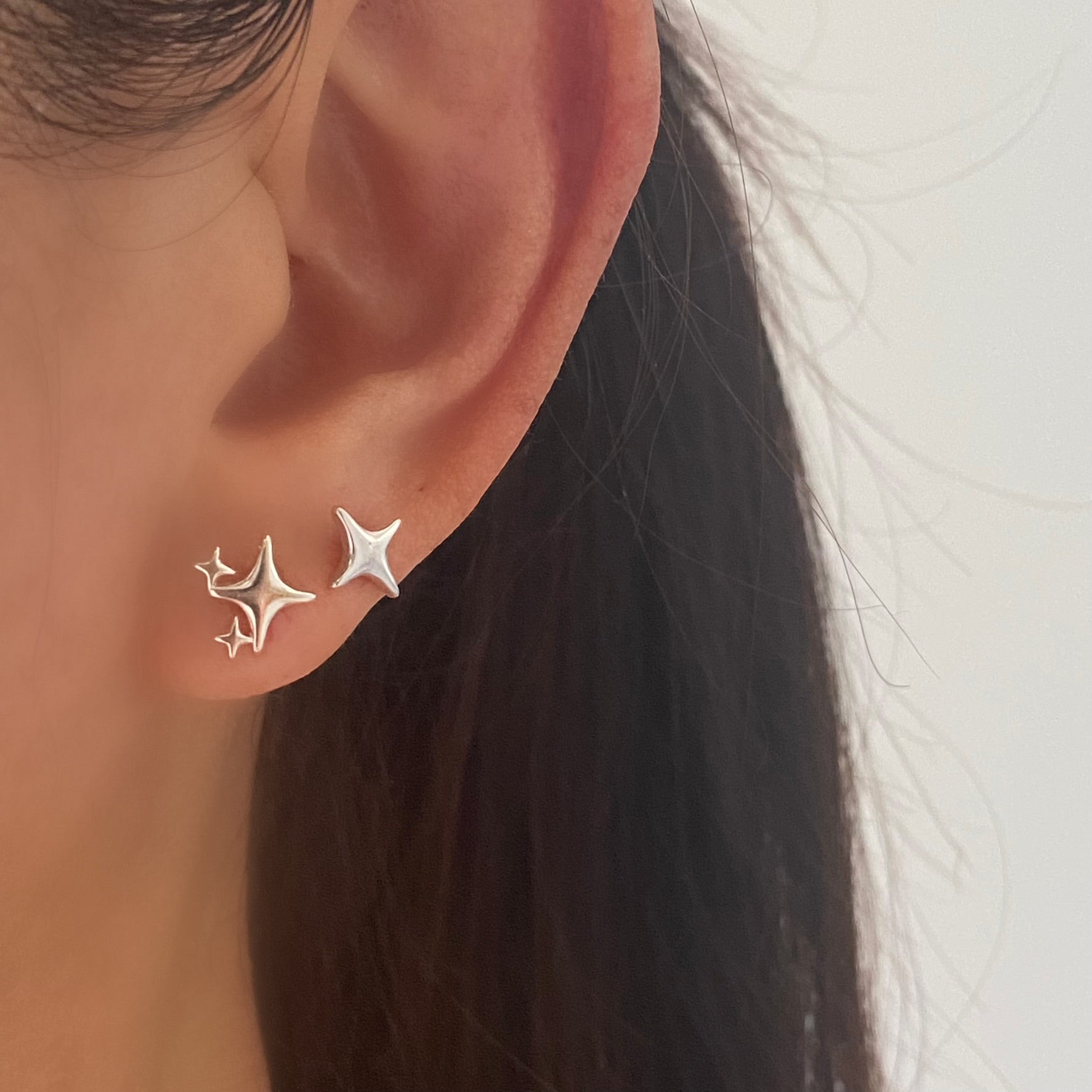 Twinkle Star Stud Earrings in Sterling Silver