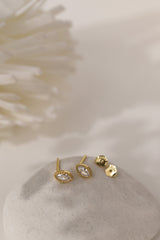 Pair of Sara gold marquise studs shown with their butterfly backs