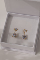 Gold Adamas ear jacket earrings presented in a white ANETT gift box.