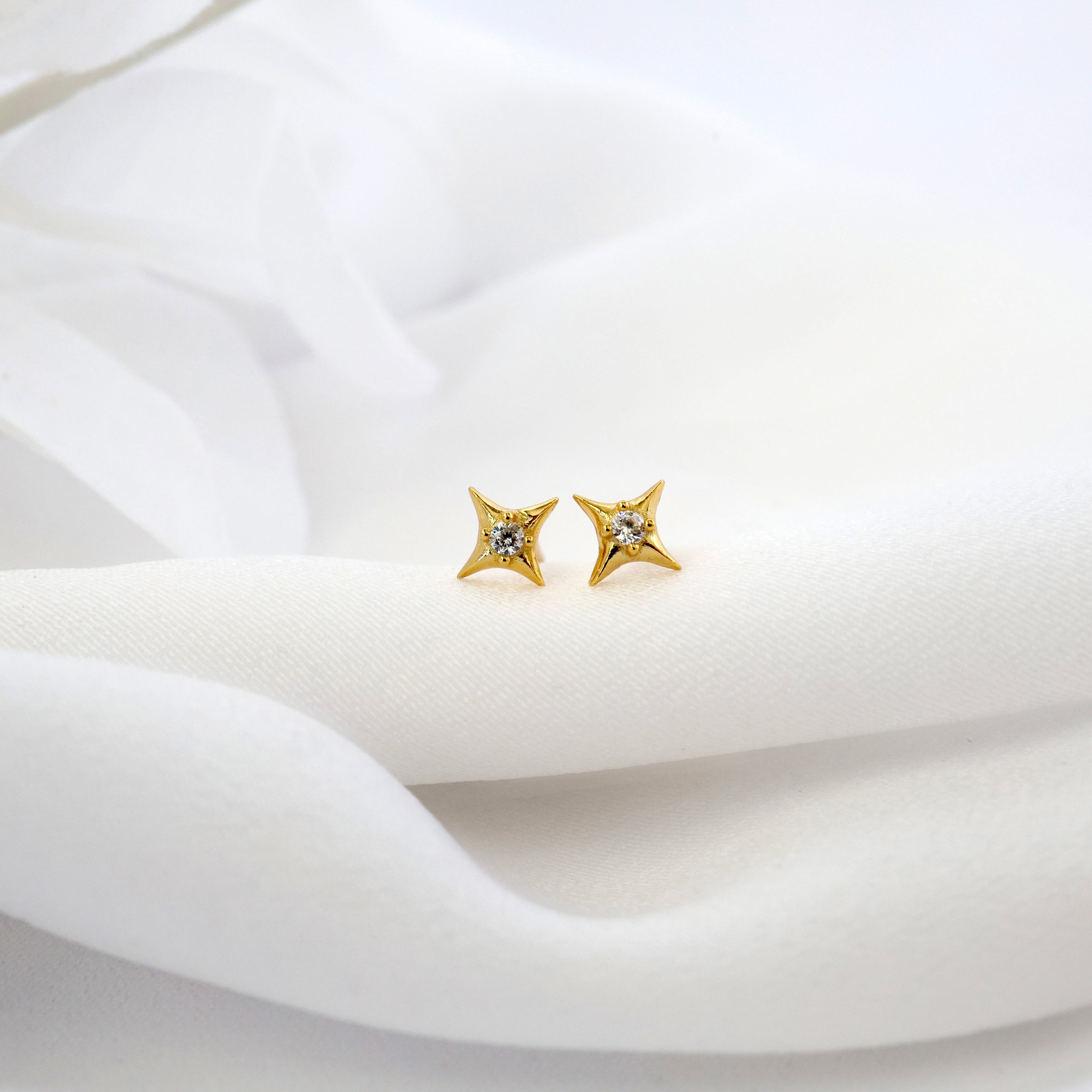 Olivia Stud earrings in gold — a small round cubic zirconia stud, option C in the Cleo stack.