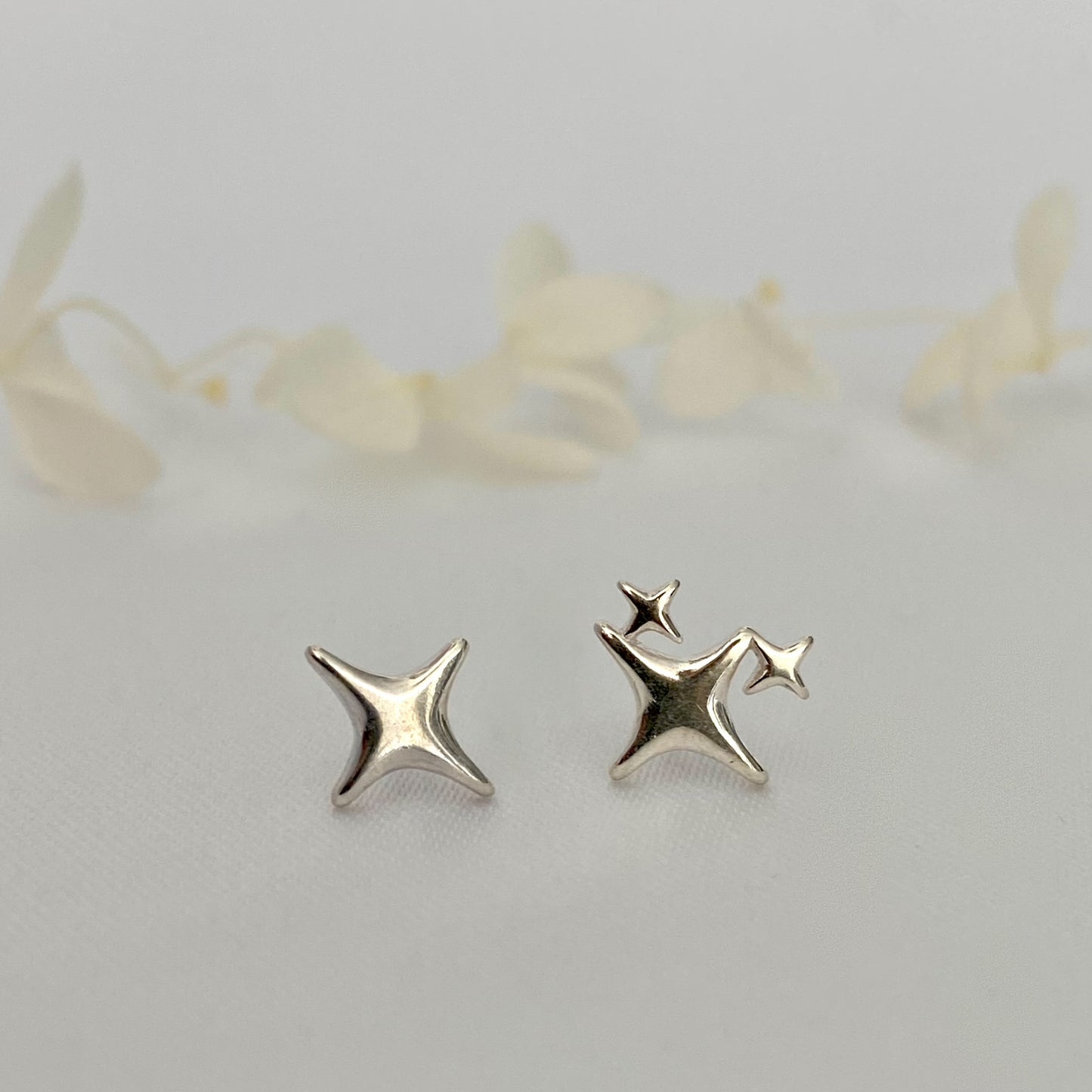 Twinkle Star Stud Earrings in Sterling Silver