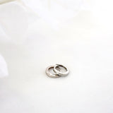 Suni Everyday Stacking Earrings in sterling silver—lightweight huggies and clover studs for effortless layering, hypoallergenic and shimmer-ready
