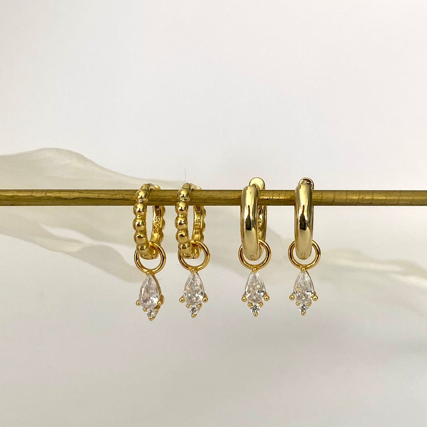 Single Clear CZ Gold Dangle Earrings