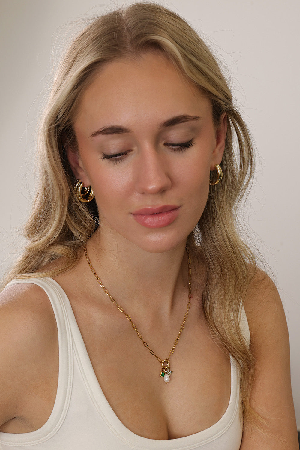 18k gold‑plated star‑engraved hoop earrings with cubic zirconia accents, shown in three sizes for a celestial, night‑sky inspired look.