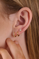 Suni Everyday Stacking Earrings in sterling silver—lightweight huggies and clover studs for effortless layering, hypoallergenic and shimmer-ready