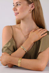 Liora & Starveil Oval Bangles Gold