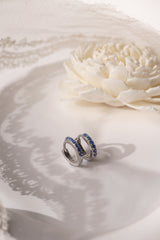 Mia Blue Huggie Dangle Earrings in Sterling Silver – rhodium-plated hoops with blue cubic zirconia, hypoallergenic dainty silver earrings for women, available individually or as part of 3-pair earring stack set