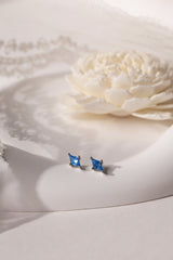 Mia Blue Huggie Dangle Earrings in Sterling Silver – rhodium-plated hoops with blue cubic zirconia, hypoallergenic dainty silver earrings for women, available individually or as part of 3-pair earring stack set