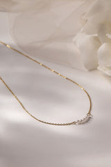 Veloura Pearl Necklace in stainless steel—five dainty pearls floating on a shimmer-ready chain, waterproof and giftable for everyday glow