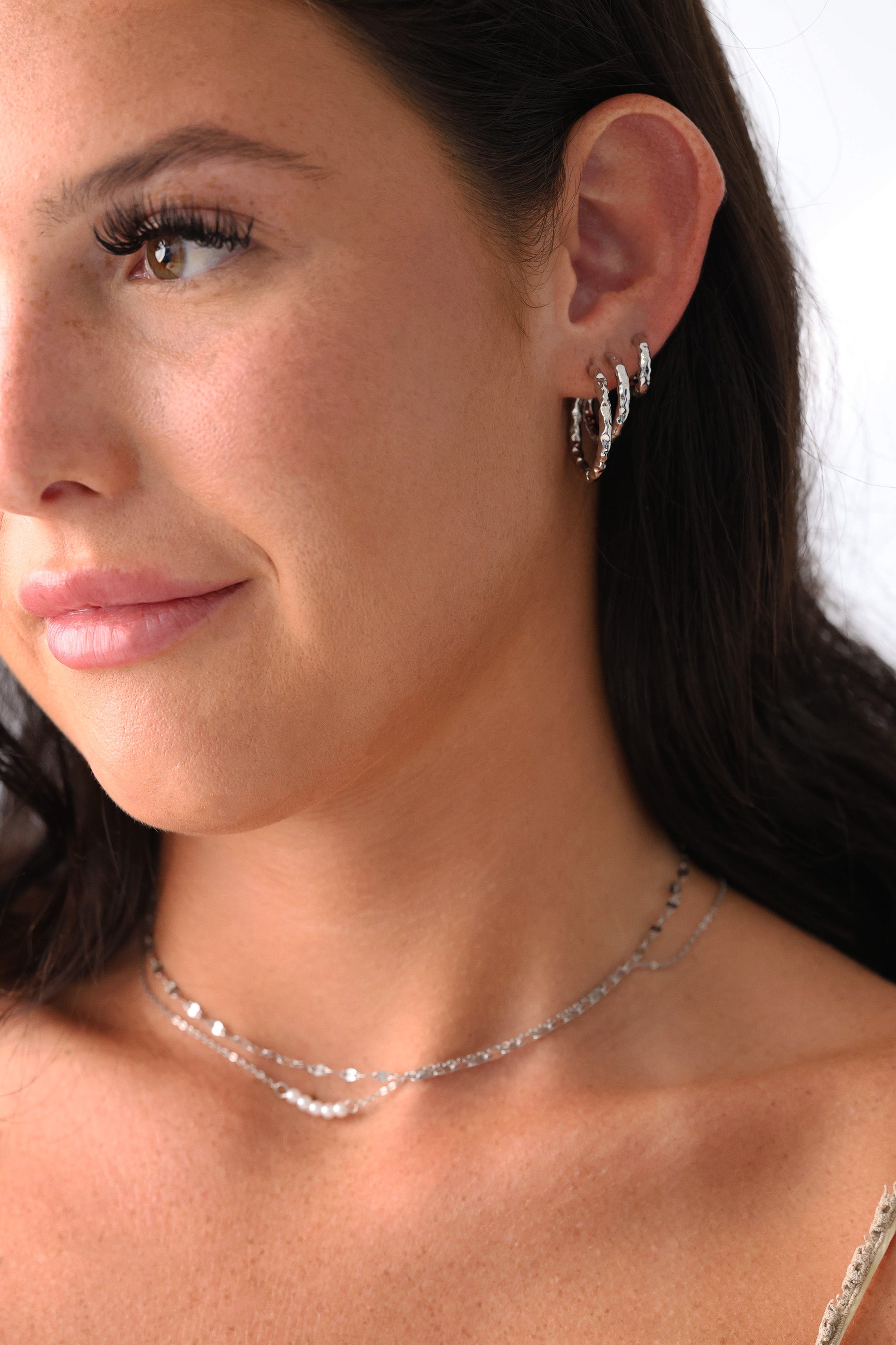 White gold hammered hoop earrings – Thalira design in small, medium, and large for stacking or solo wear