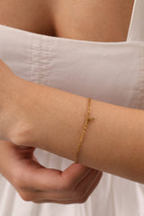 Stainless steel initial bracelet with sleek letter charm, delicate chain, minimalist look, waterproof and tarnish‑resistant