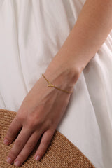 Stainless steel initial bracelet with sleek letter charm, delicate chain, minimalist look, waterproof and tarnish‑resistant