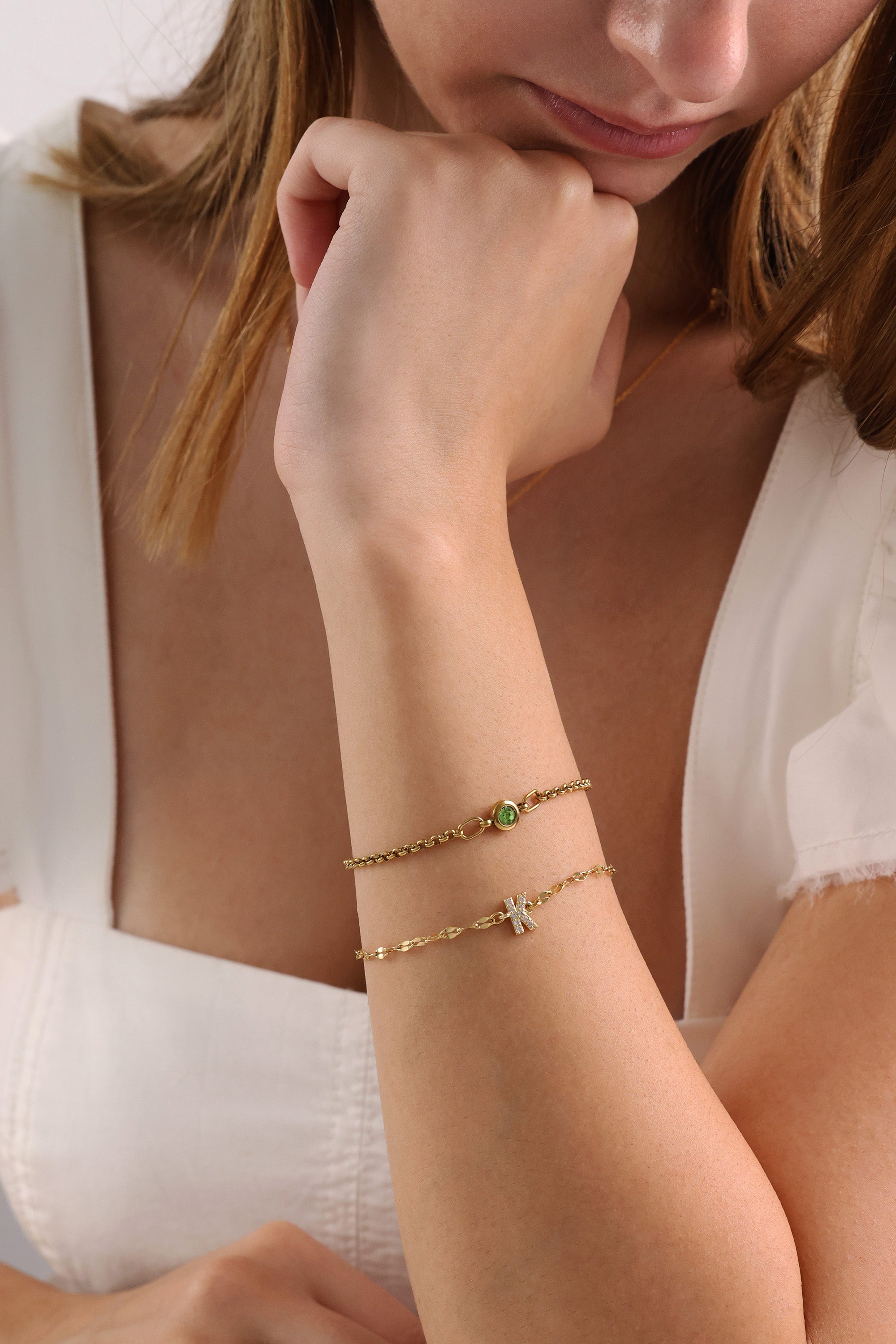Dainty 18k gold-plated stainless steel birthstone bracelet with a single bezel-set gemstone, symbolizing personal meaning and everyday elegance.