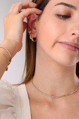 Skinny 2.5mm stainless steel tennis necklace with sparkling stones, waterproof design, casual yet elegant, paired with matching bracelet.