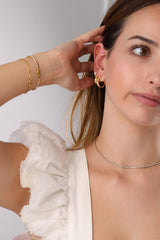 Skinny 2.5mm stainless steel tennis necklace with sparkling stones, waterproof design, casual yet elegant, paired with matching bracelet.