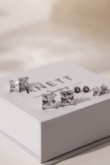 Princess cut CZ stud earrings in 9mm, 7mm, and 5mm, set in sterling silver