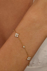 Gold 4 clover bracelet in waterproof stainless steel with cubic zirconia stations
