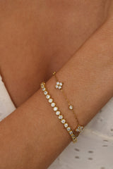 Dainty gold clover charm bracelet with bezel-set cubic zirconia stones