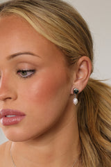 Vivienne silver pearl drop stud earrings — full view of the 27mm drop