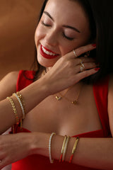 Gold Lustrous Elegance Bracelet with AAAAA cubic zirconia stones, featuring a sleek and timeless design tennis bracelet stacks