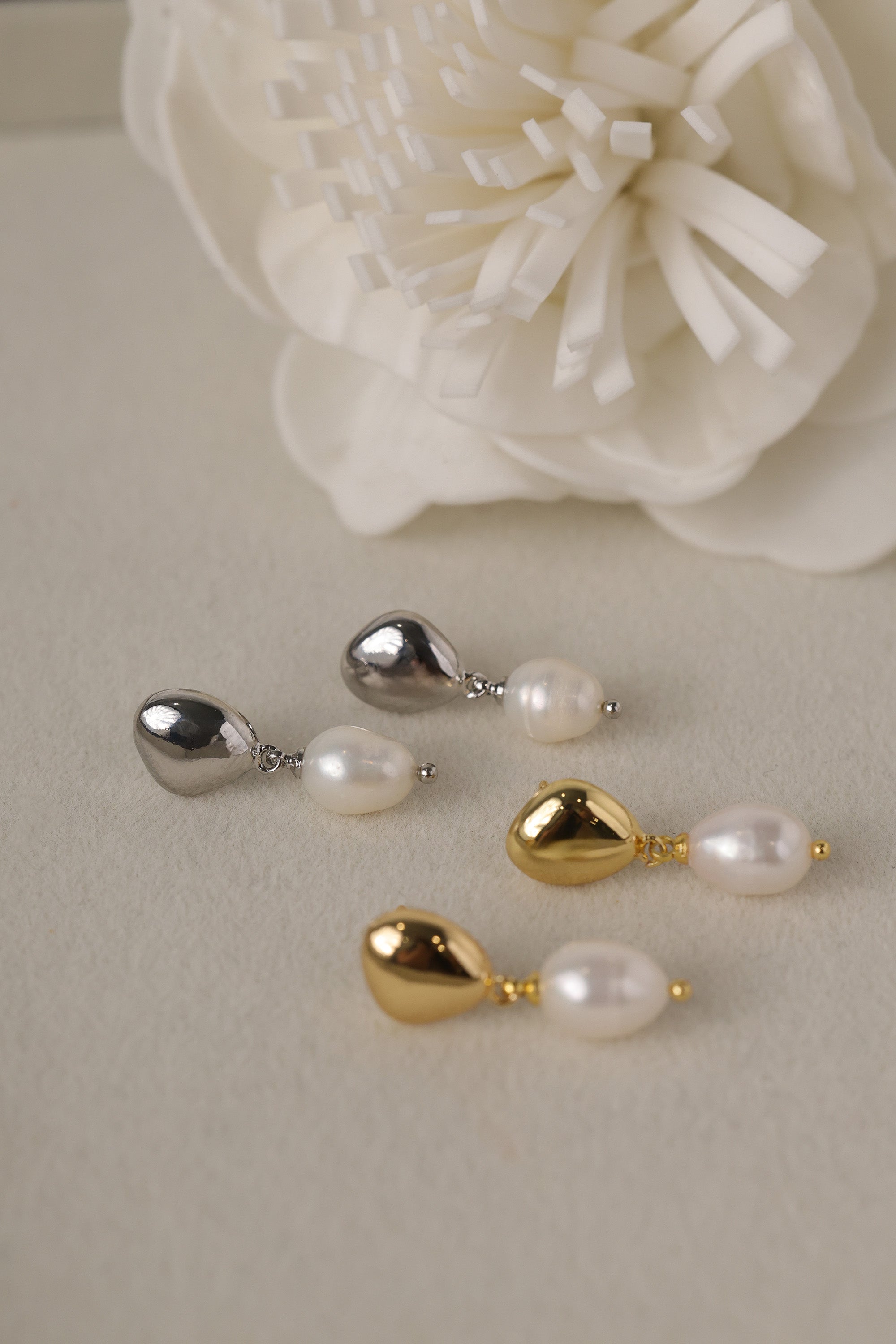 Vivienne pearl drop stud earrings shown in both gold and white gold plate