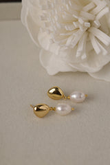 Vivienne gold pearl drop stud earrings — close-up of the freshwater pearl