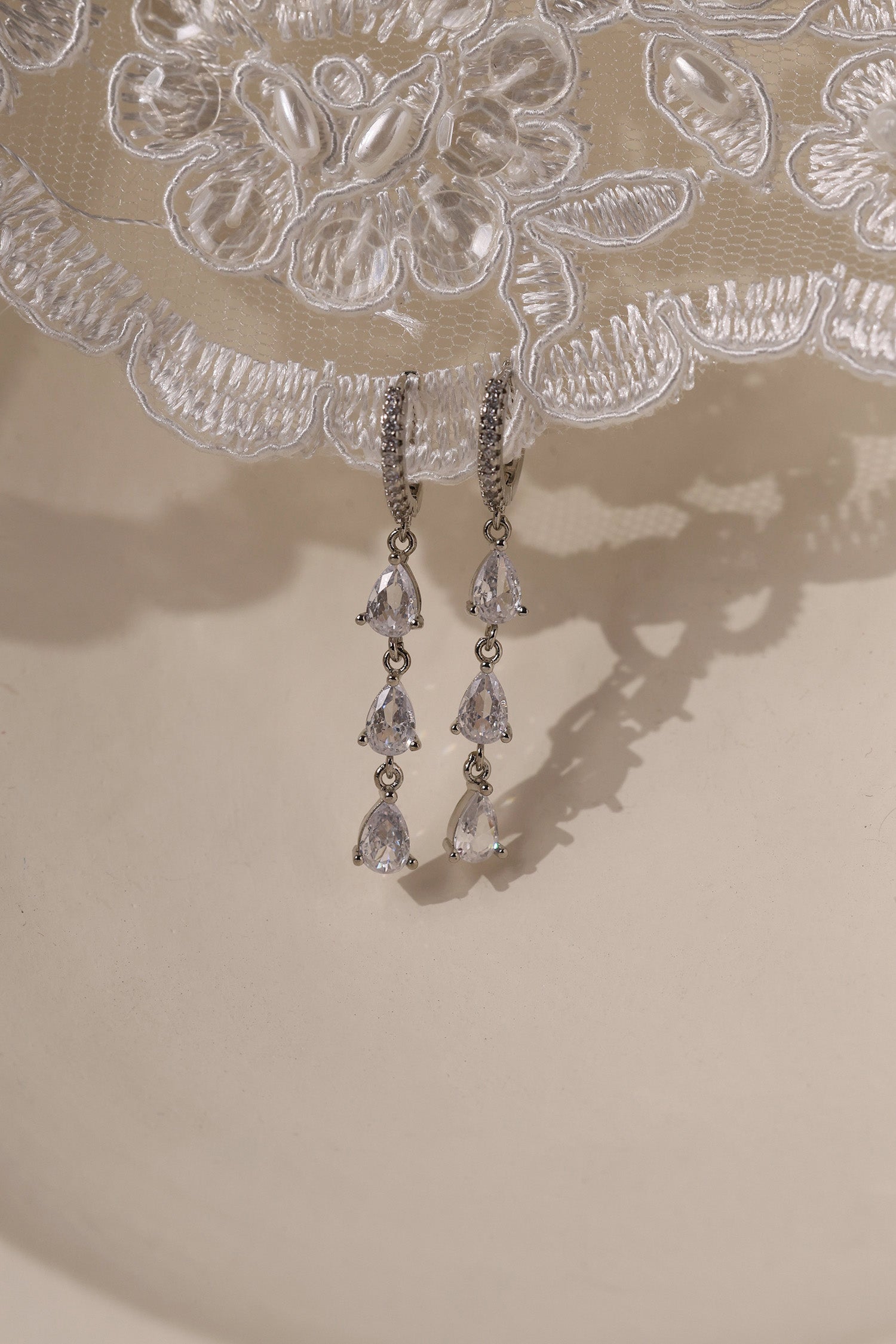 May 3 Teardrop Dangle Silver Earrings