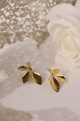 Gold stainless steel leaf‑shaped stud earrings