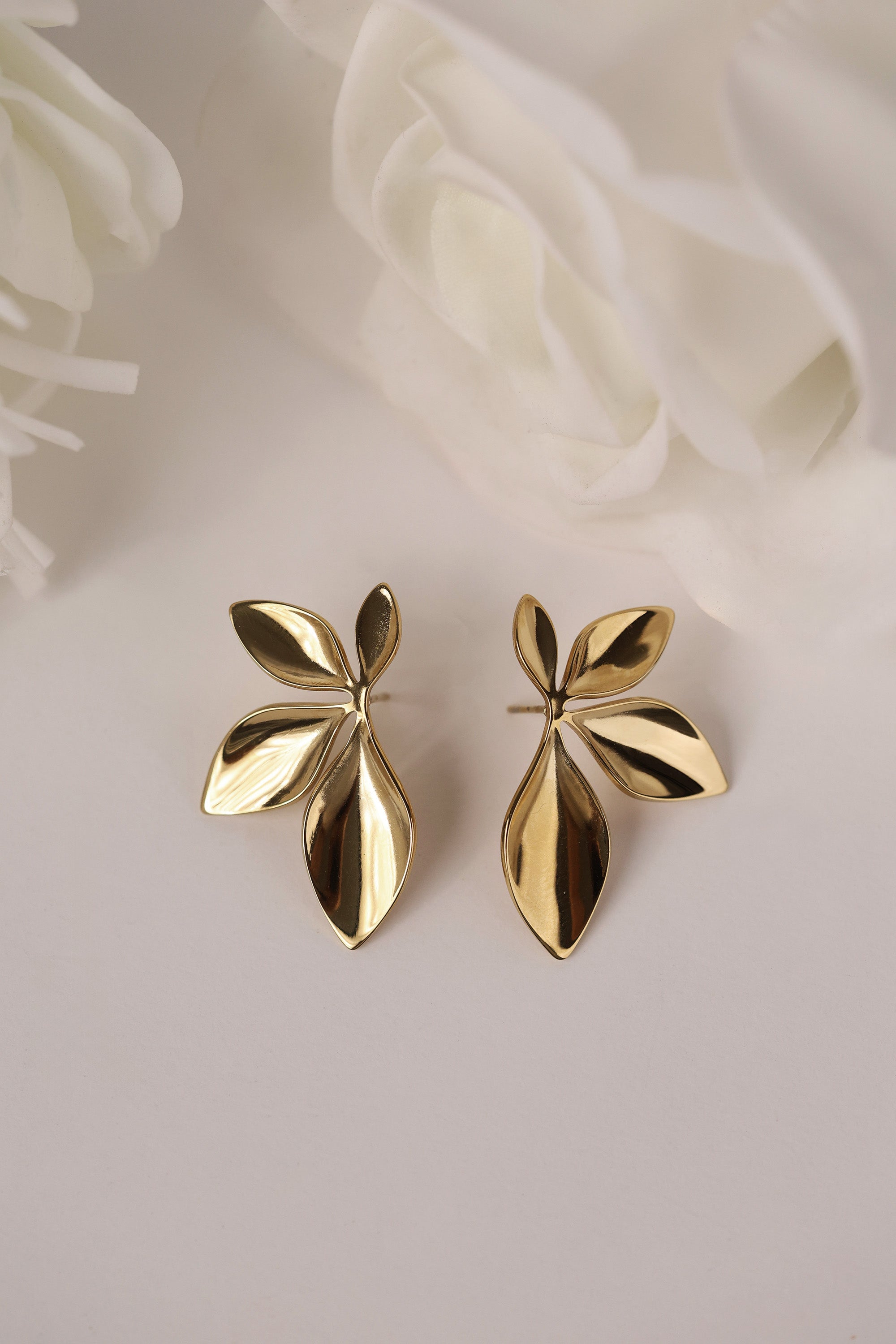 Gold stainless steel leaf‑shaped stud earrings