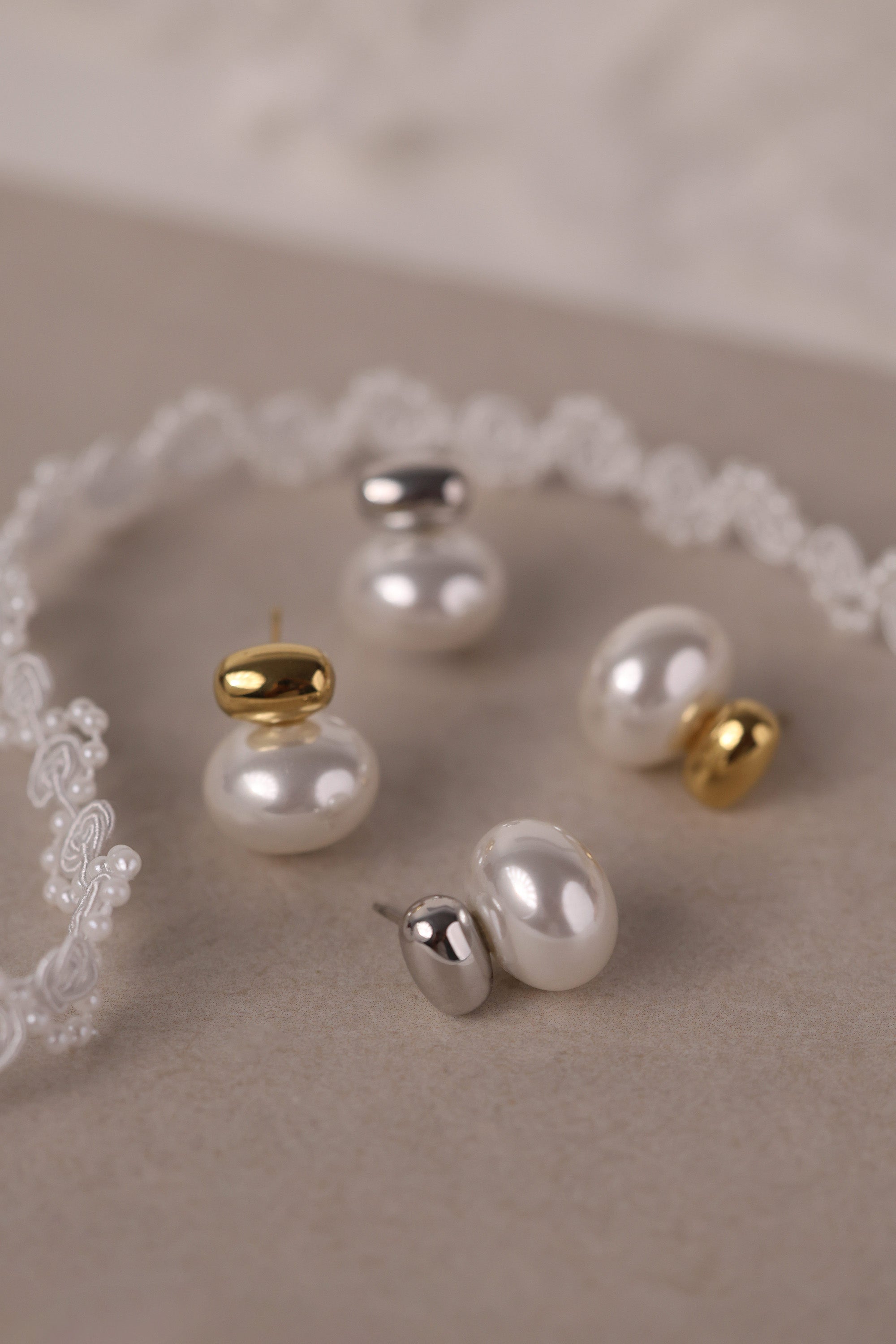 Stainless steel pearl stud earrings with a polished silver bead waterproof tarnish free bridemaid earrings