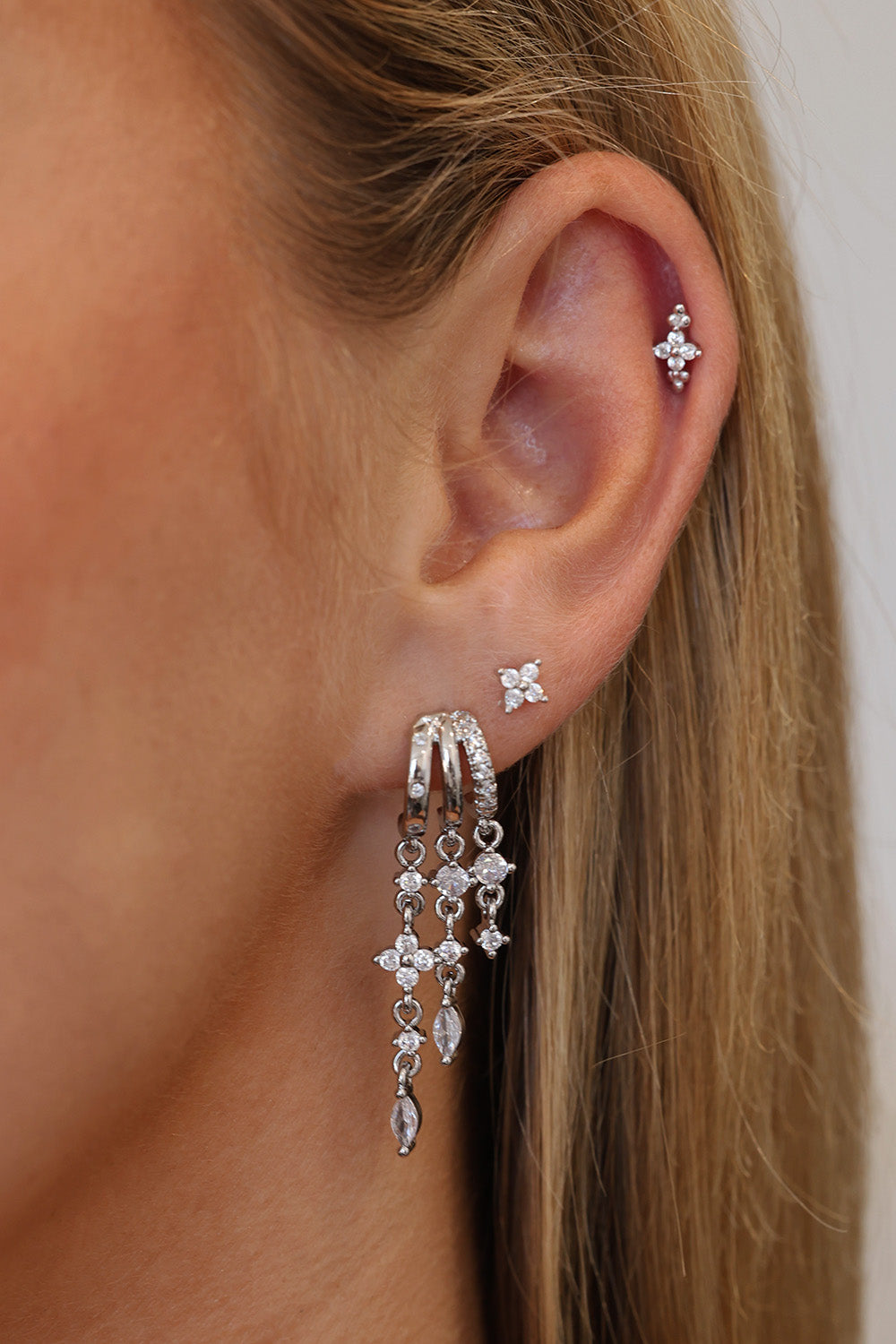 Silver triple‑drop illusion earrings with sparkling stones -Anett Jewellery