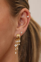 Gold triple‑drop illusion earrings with sparkling stones -Anett Jewellery
