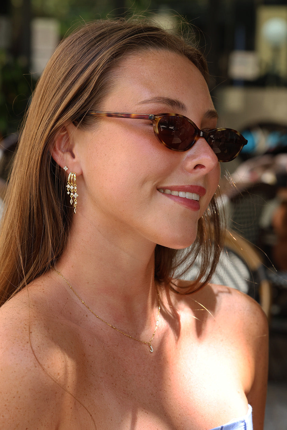 Gold triple‑drop illusion earrings with sparkling stones -Anett Jewellery