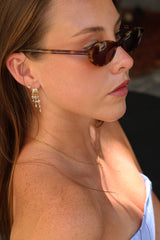 Gold triple‑drop illusion earrings with sparkling stones -Anett Jewellery