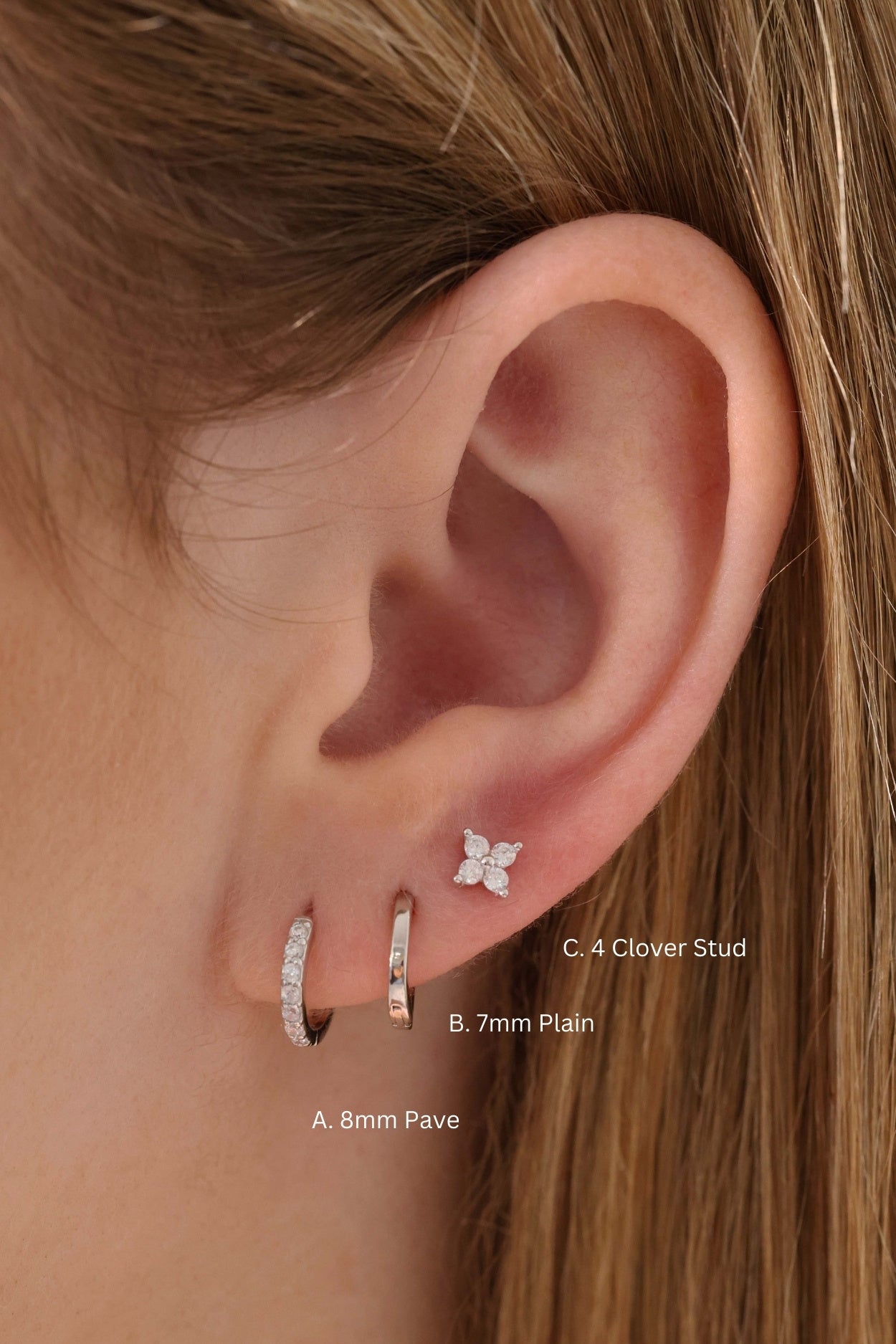 Suni Everyday Stacking Earrings in sterling silver—lightweight huggies and clover studs for effortless layering, hypoallergenic and shimmer-ready