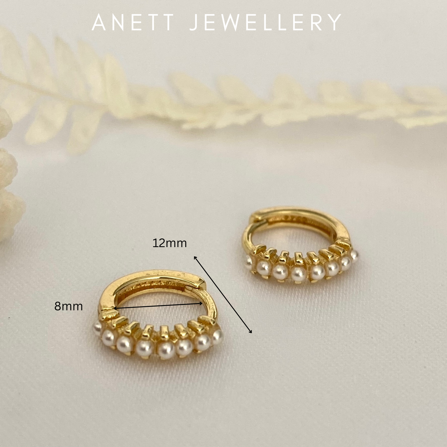 Scarlet Huggie Hoop Earrings in White Pearl main image 0