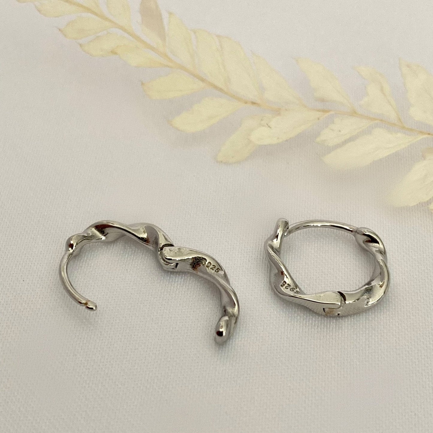 Sterling Silver Twisted Hoops Silver