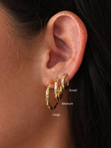 Radiant hammered finish hoop earrings – Thalira design in 18K gold and white gold, stackable in three sizes