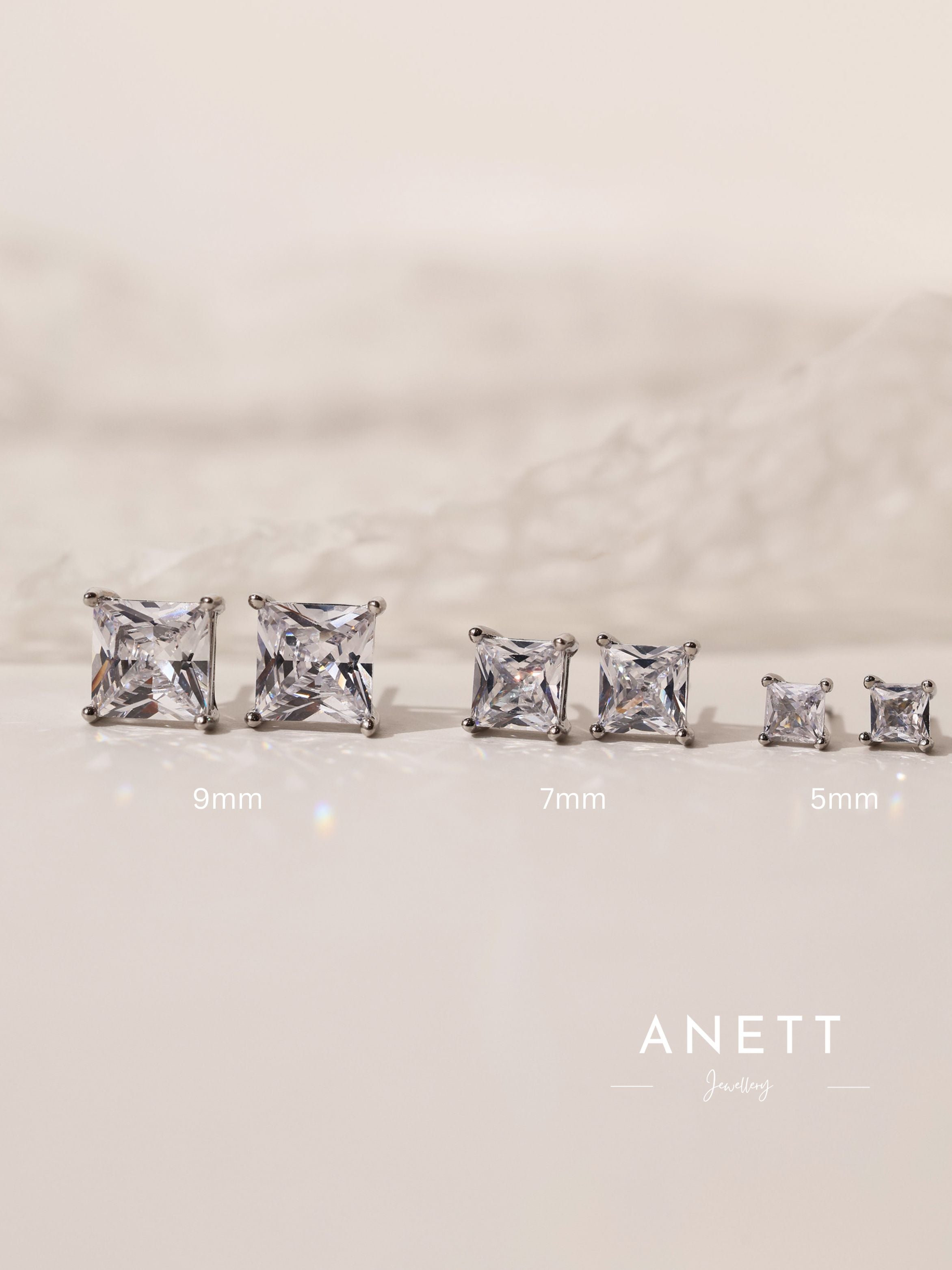 Princess cut CZ stud earrings in 9mm, 7mm, and 5mm, set in sterling silver