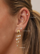 Gold triple‑drop illusion earrings with sparkling stones -Anett Jewellery