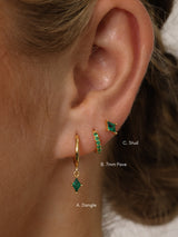 Emerald green cubic zirconia dangle drop earring set featuring brilliant faceted stones that sparkle from every angle. Includes three coordinating pieces that can be worn together or individually for an elegant, sophisticated look.